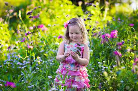 A little girl in a field of flowers