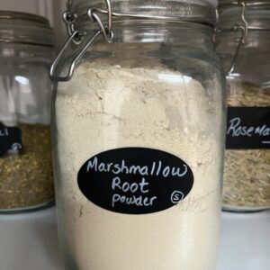 Jar of marshmallow root powder on shelf.