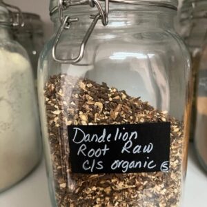 Jar of raw organic dandelion root.